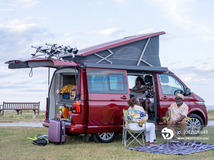 Family camping in camper van