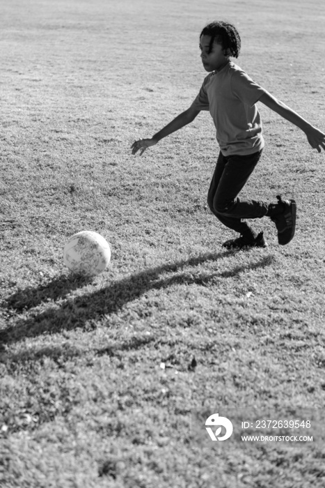 child playing on soccer