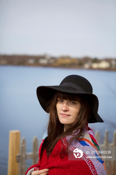 Portrait of mid adult woman wearing hat