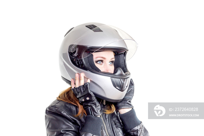Young girl with a motorcycle helmet on a white background close-up