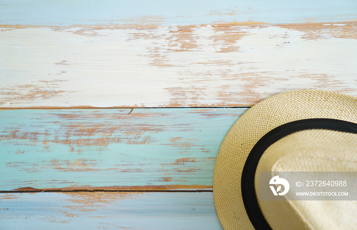 Closeup top view studio shot of traveler passenger fashionable beautiful weaving rattan hat with bla