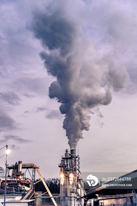 smoke coming out of factory chimney industry and global warming