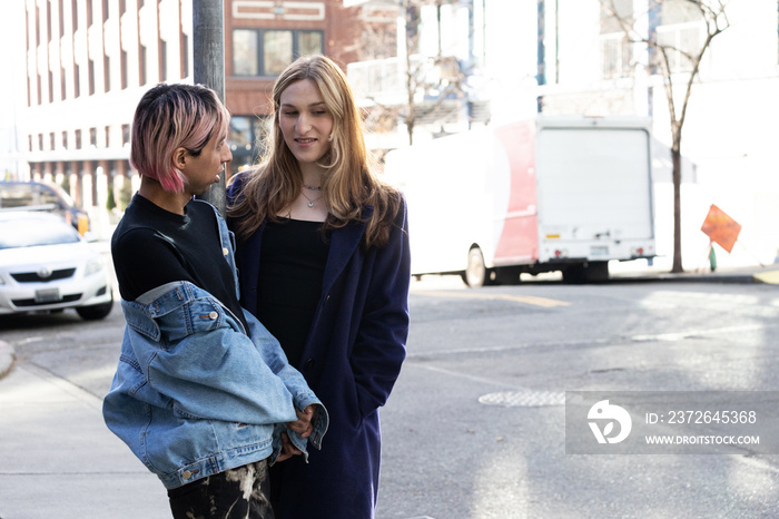 Lgbtqia friends walking in the city.