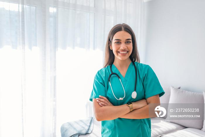 Portrait of an attractive young female doctor or nurse with stethoscope