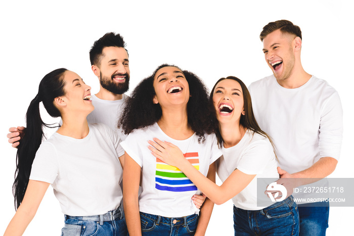 milticultural group of young people laughing with african american woman with lgbt sign on t-shirt i