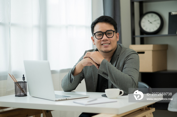 Young handsome asian Ceo manager businessman middle-aged man around the age of 35 sitting in office 