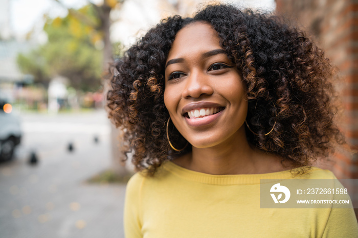 Portrait of young afro-american woman smiling.