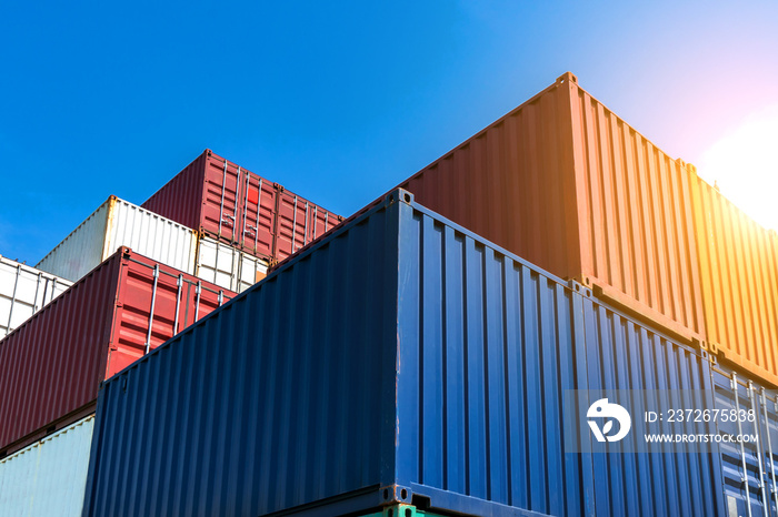 Stack of containers box from Cargo freight ship for import-export at harbor and transportation indus