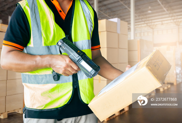 warehouse inventory management. distribution warehouse and logistics. warehouse worker in uniform is