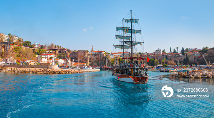 Tourists enjoying sea journey on sail yacht - Old town  Kaleici  -Antalya, Turkey