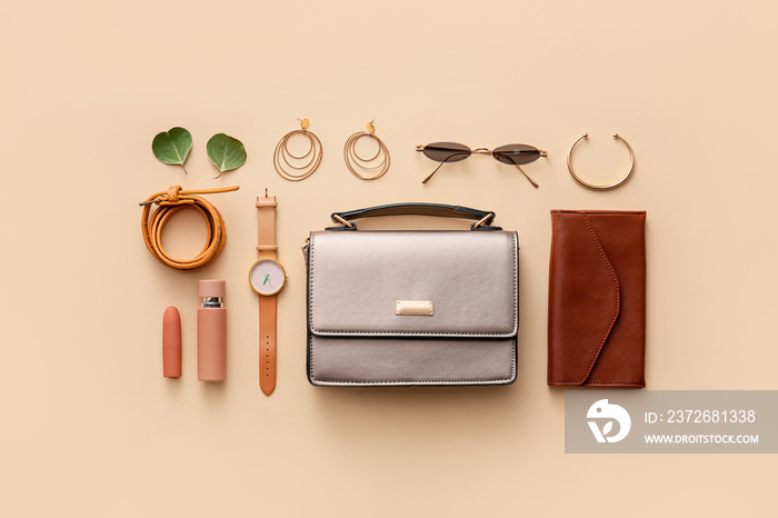 Composition with stylish bag and accessories on color background