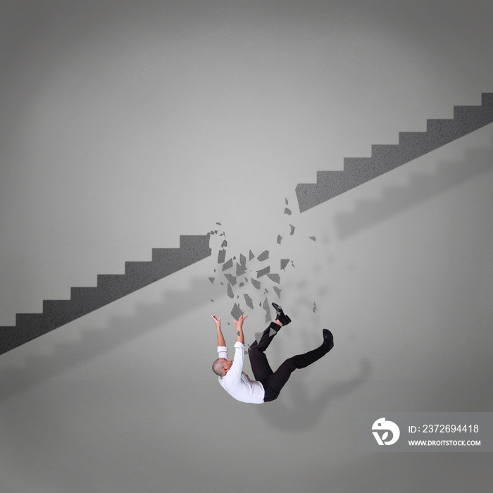 Businessman Falling Down From Broken Stairs