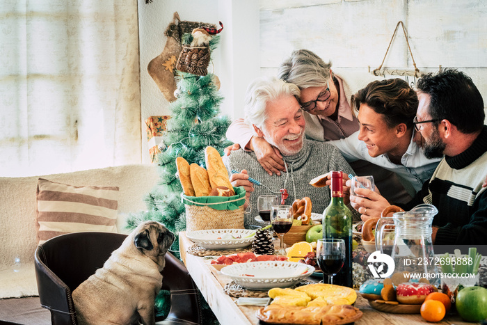 Family group people enjoy lunch together in christmas days season - happy caucasian enjoy food and i