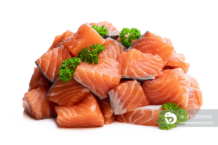 Fresh salmon fillet cubes isolated on white