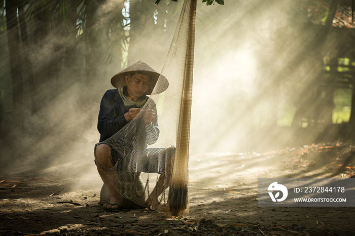 hope life fisherman  of mekong river