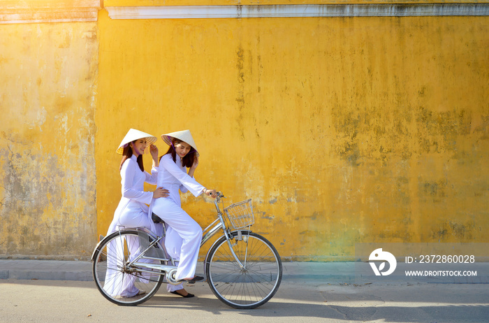 Beautiful  woman with Vietnam culture traditional ,vintage style,Hoi an Vietnam