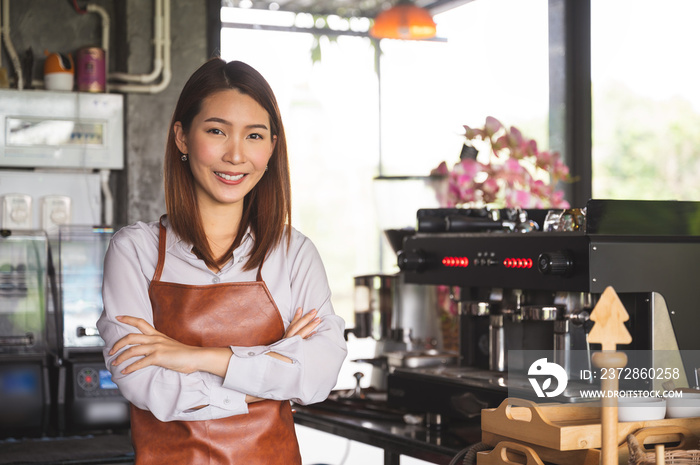 Startup new business concept. Portrait of Asian female working in her coffee shop