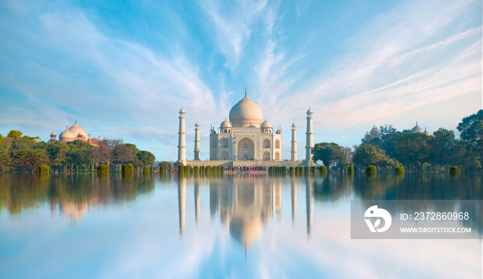 Panoramic view of Taj Mahal during bright blue sky reflected in water - Agra , Uttar Pradesh, India