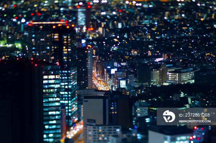 A night miniature highway at the urban city in Tokyo high angle tiltshit