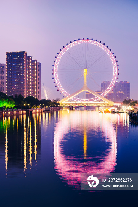 Night scene cityscape of Tianjin ferris wheel,Tianjin eyes in twilight time.Most Modern and popular 
