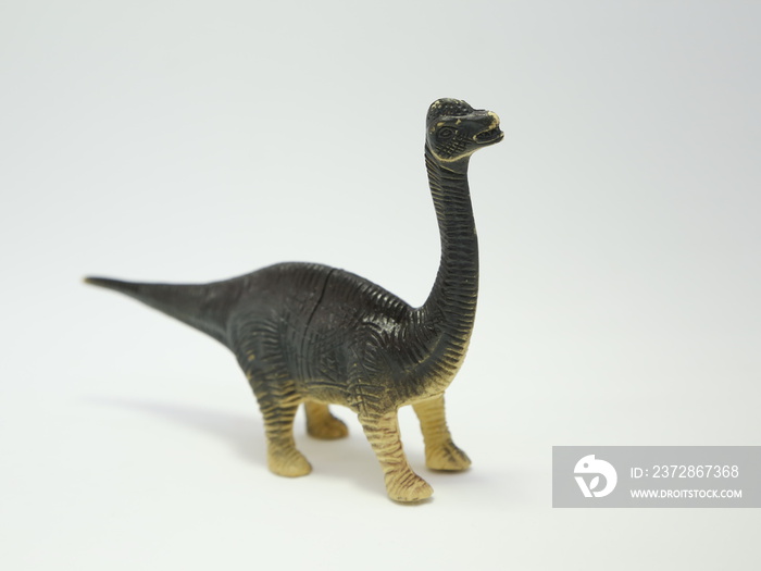 青铜龙。儿童玩具恐龙。塑料玩具。恐龙。
