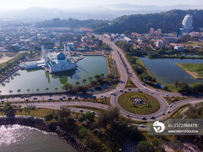 Bird eyes view of beautiful Kota Kinabalu mosque, famous landmark in Kota Kinabalu with clear blue s