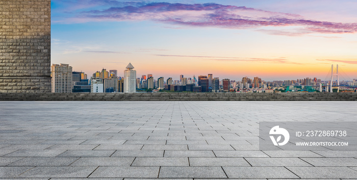 Empty square floor and Shanghai skyline with buildings at dusk,China.High angle view.