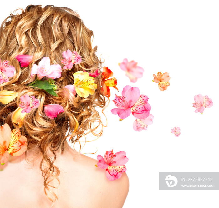 Hairstyle with colorful flowers. Haircare concept. Backside view