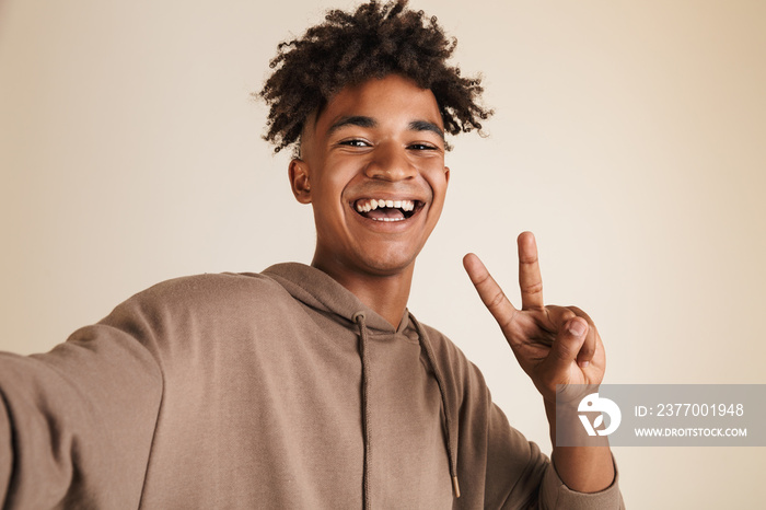 Portrait of a cheerful young afro american man