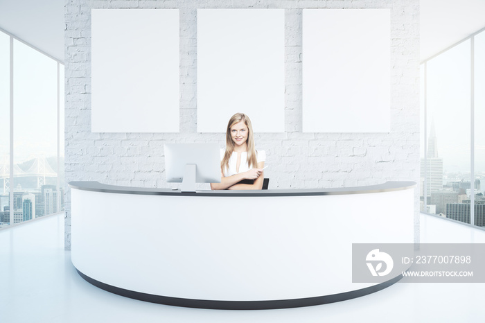 Cheerful woman at reception desk