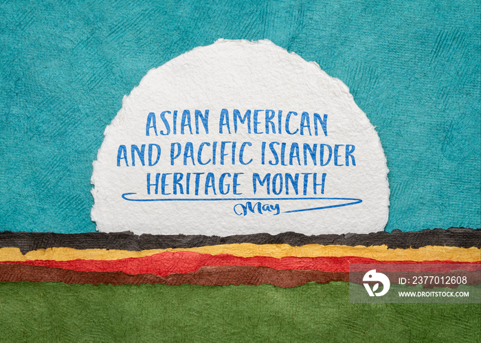 Asian American and Pacific Islander Heritage Month, May - handwriting on an art paper against abstract landscape, reminder of cultural event