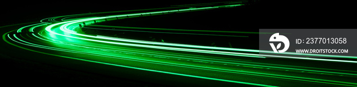 green car lights at night. long exposure