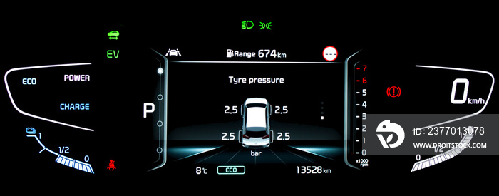 TPMS (Tire Pressure Monitoring System) monitoring display on car dashboard panel. The pressure measurement given in bar. Digital screen shows right correct tyre pressure. Car cluster in hybrid vehicle