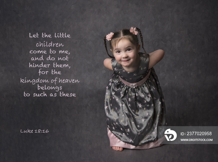 Little girl with New Testament scripture about children and the kingdom of heaven