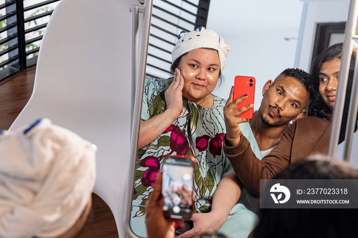 Group of friends doing their skin care together at home