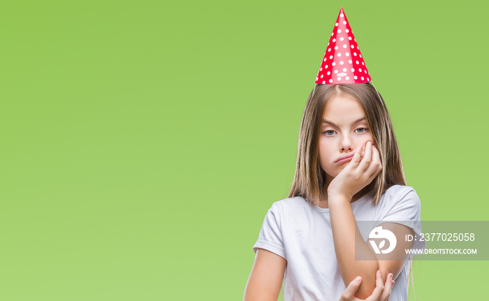 Young beautiful girl wearing birthday cap over isolated background thinking looking tired and bored with depression problems with crossed arms.