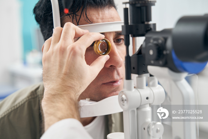 Male having medical eye examination in hospital