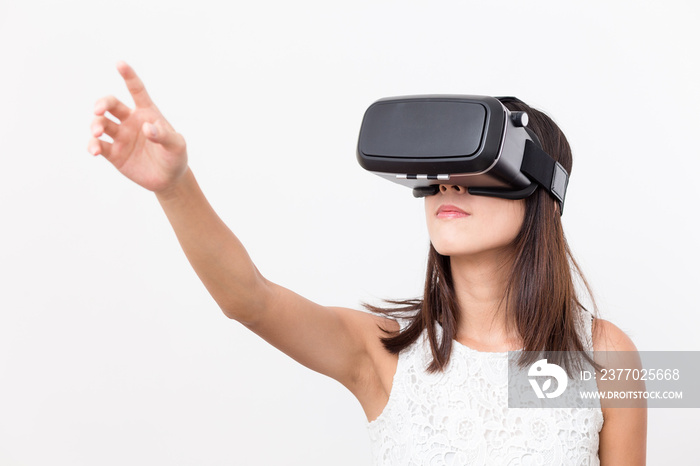 Woman play game though VR device