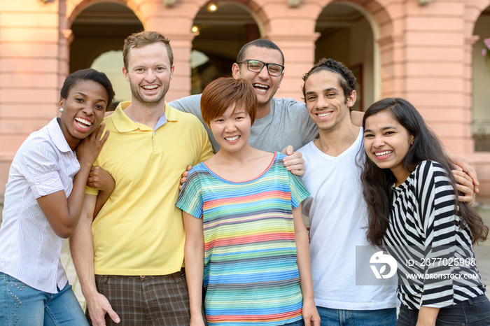 Multicultural group of people posing for portrait