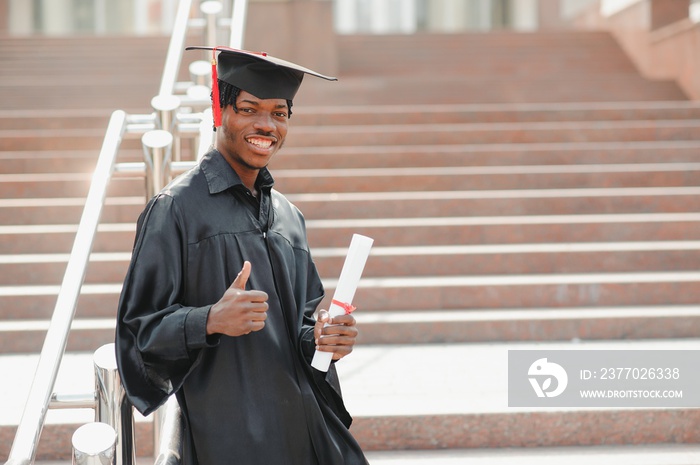 Man smilling at university graduation celebration