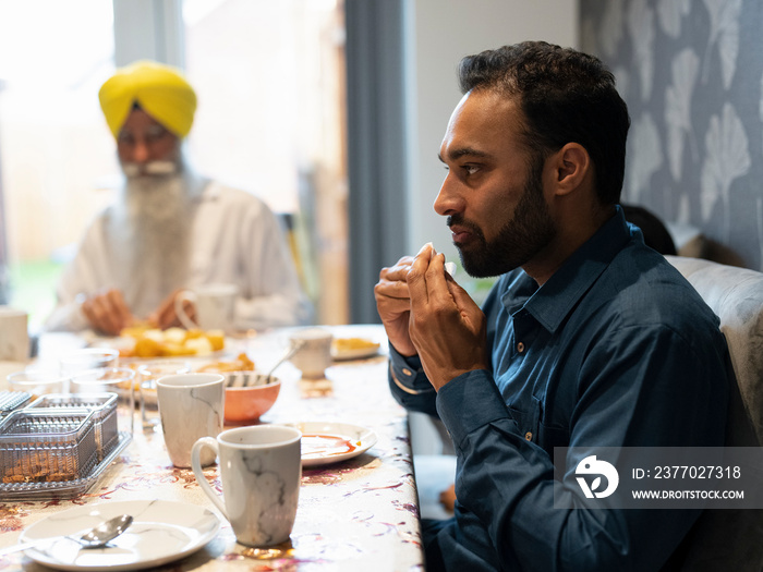 Family having traditional meal at home