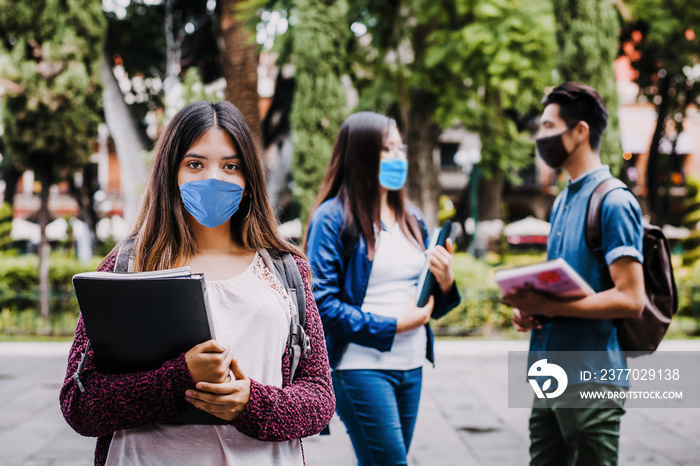 mexican girl student wearing mask face to prevent infection or respiratory illness, Latin People with Protection against contagious coronavirus in Mexico or Latin America