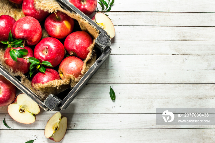 Red apples in a box.