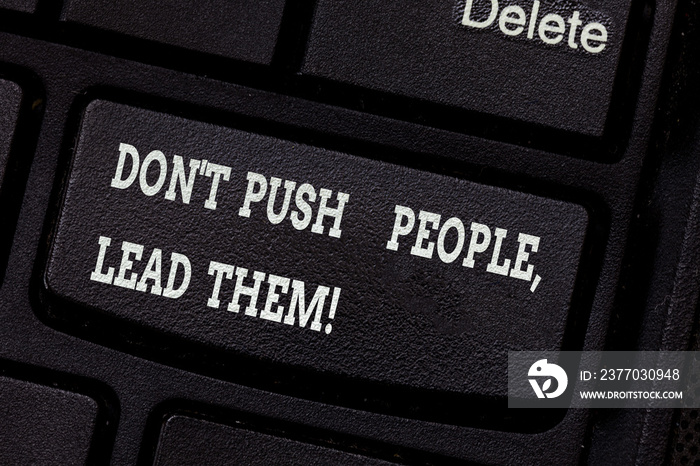 Writing note showing Don T Push People Lead Them. Business photo showcasing Be kind and motivate your staff to take action Keyboard key Intention to create computer message pressing keypad idea