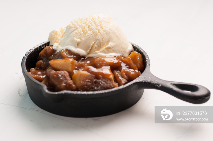 Apple bake with vanilla ice cream dessert