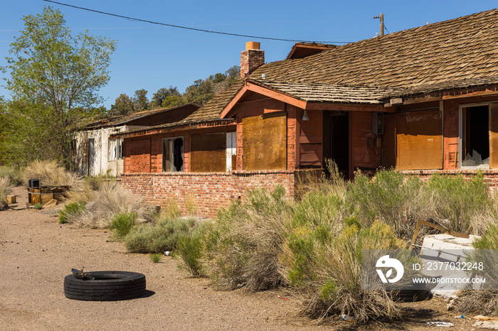 Abandoned, destroyed buildings at 6 road, Nevada, USA.