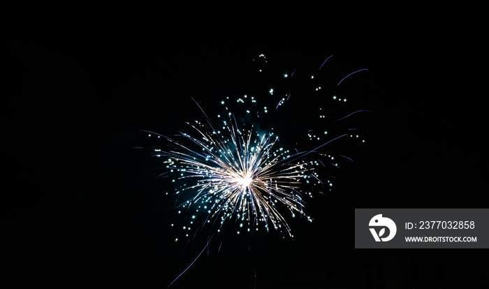 Beautiful display of fireworks on a dark sky on New Years Eve