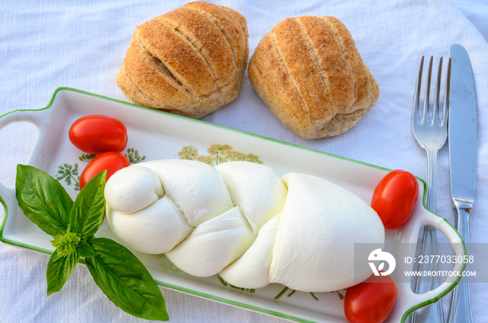 Fresh soft white italian cheese braid mozzarella buffalo made from Italian buffalo’s milk by pasta filata method