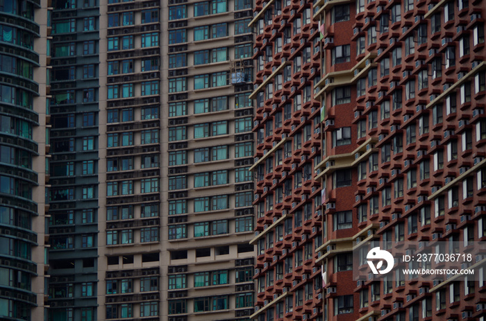 Hong Kong highrise apartment buildings facades windows endless concrete jungle