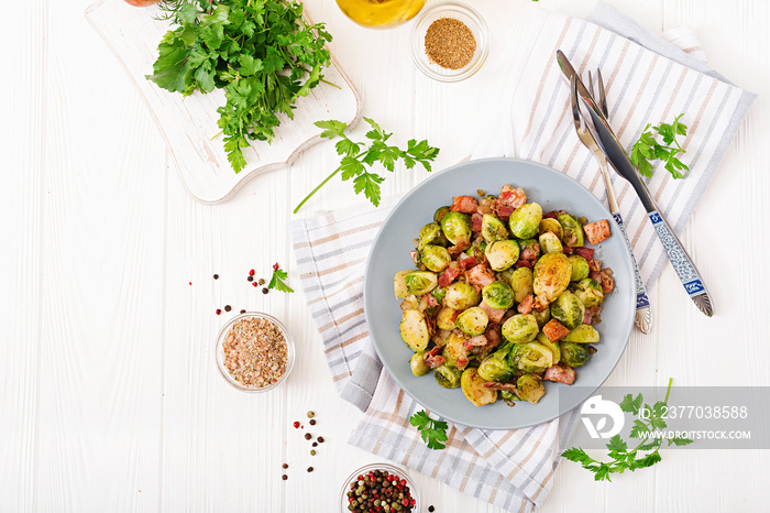 Brussels sprouts. Roasted Brussels sprouts with bacon. Delicious lunch. Flat lay. Top view